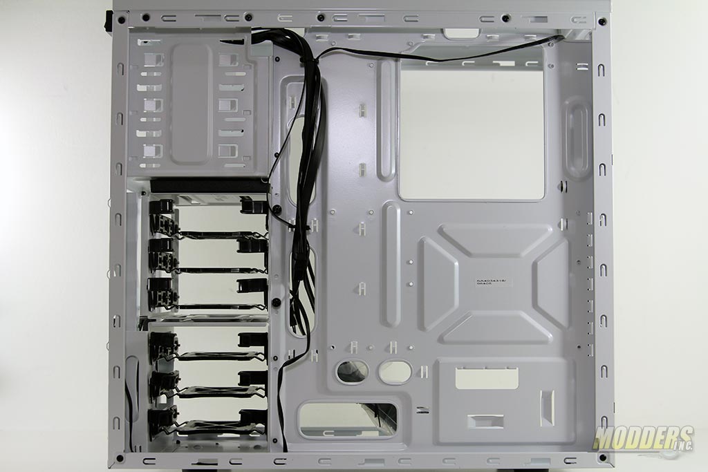 Behind the motherboard tray