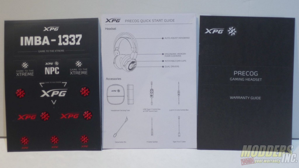Documentation and stickers included with the XPG Precog